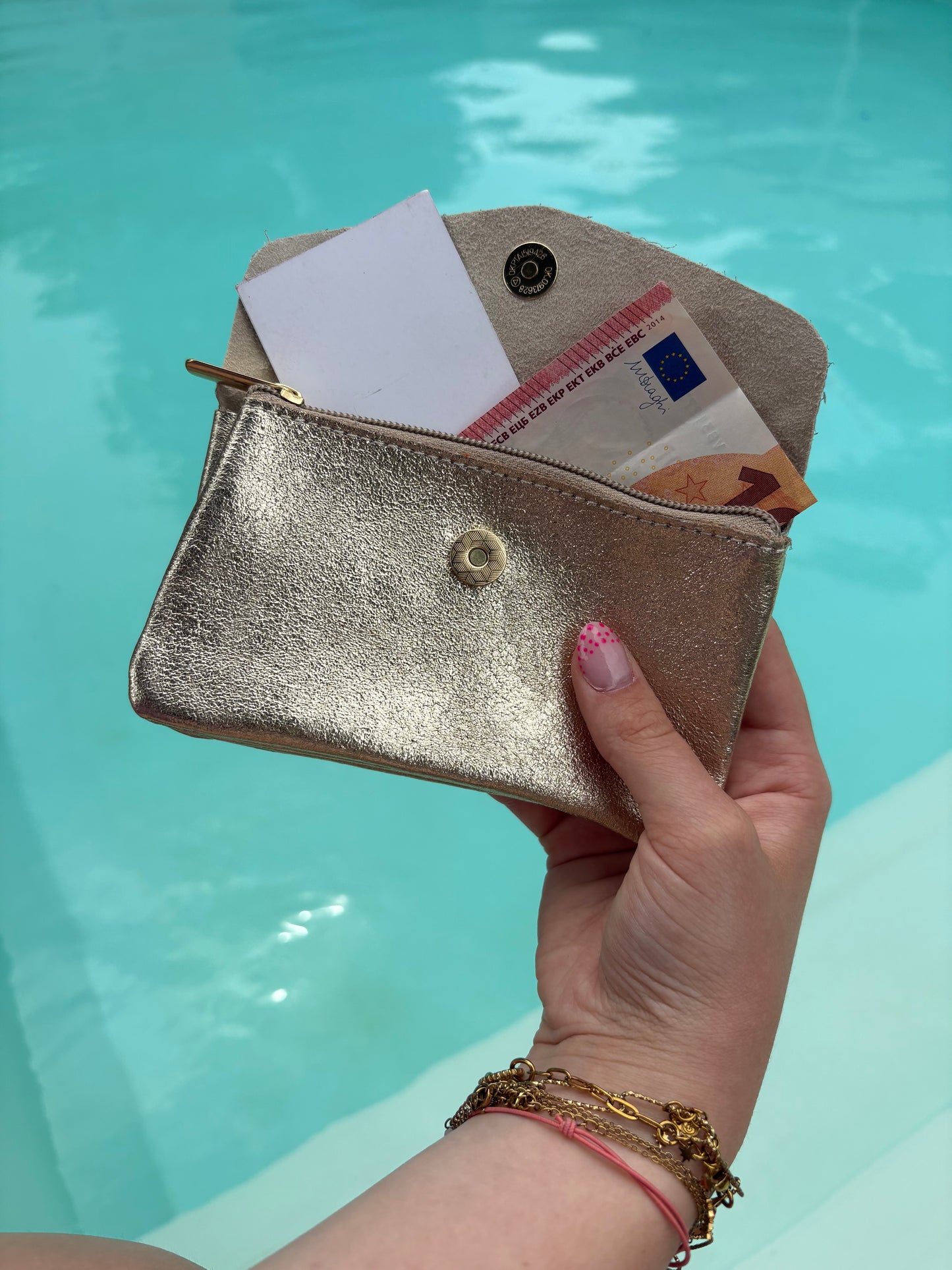 Porte-feuille doré pailleté