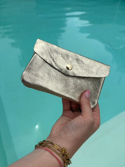 Porte-feuille doré pailleté