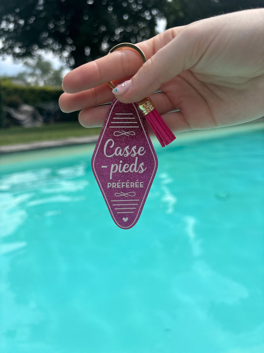 Porte-clés « Casse-pieds préférée » fuchsia pailleté