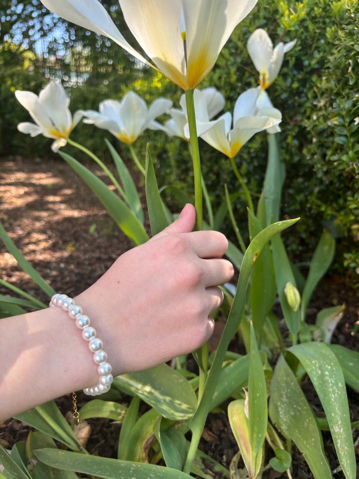 Bracelet Adèle perles blanches et acier inoxydable doré